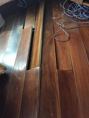 物流木地板（物流公司家具送货安装 消费者的木地板被砸出一个洞）-图2